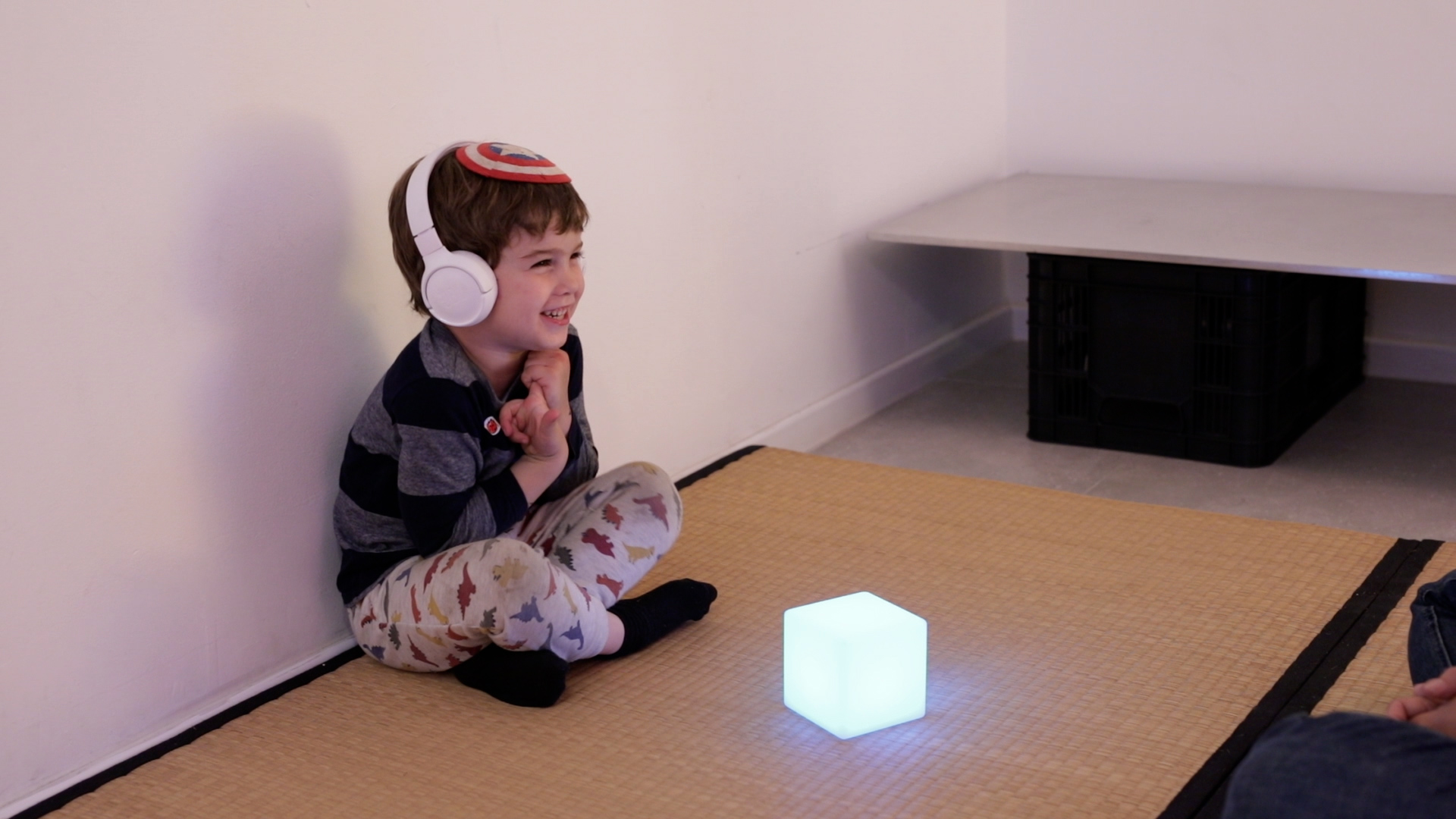 Child interacting with AI in MOO session